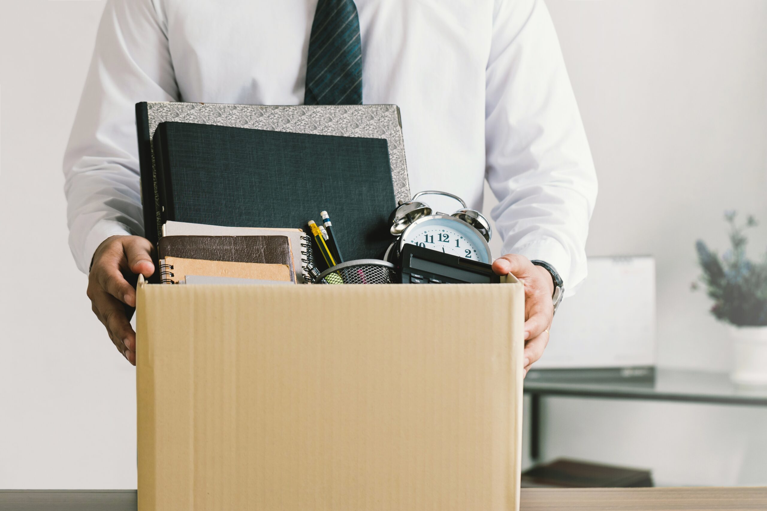 Schenkeveld Advocaten - Resignation.,Businessmen,Holding,Boxes,For,Personal,Belongings,And,Resignation,Letters.quitting